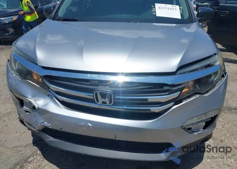 2018 Honda Pilot Lx z USA, uszkodzony, nr VIN 5FNYF5H10JB001132